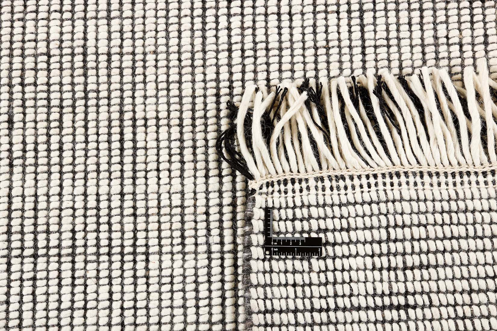 Dark grey and white textured flatweave rug