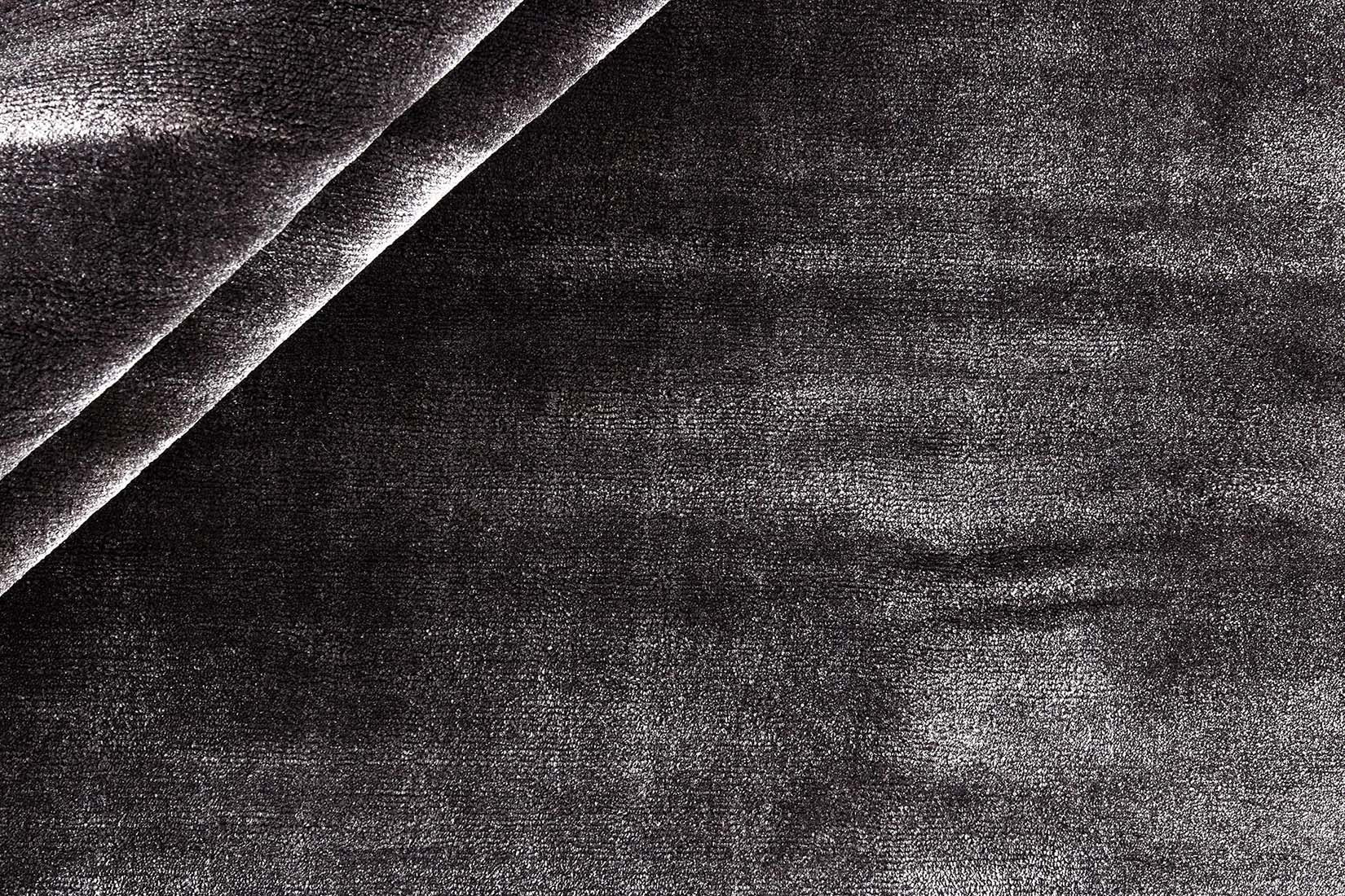 modern black plain rug