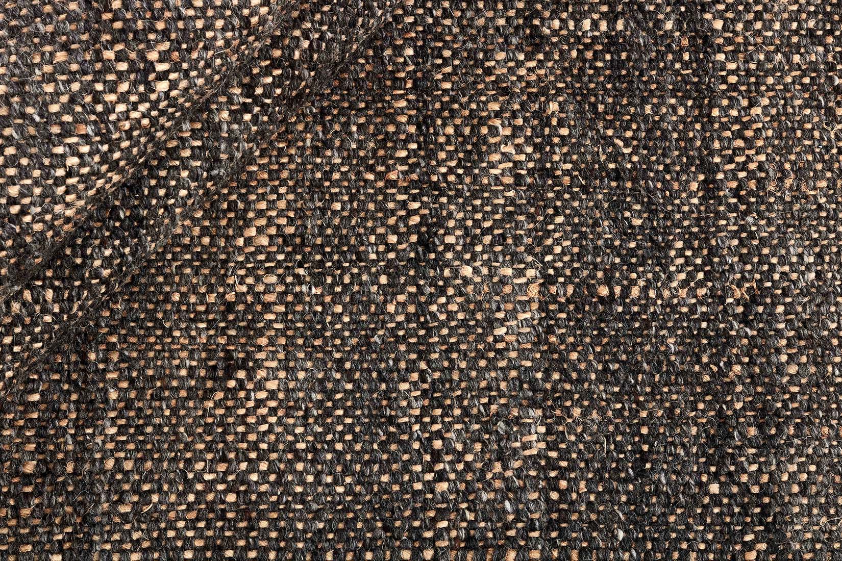 Black textured flatweave rug