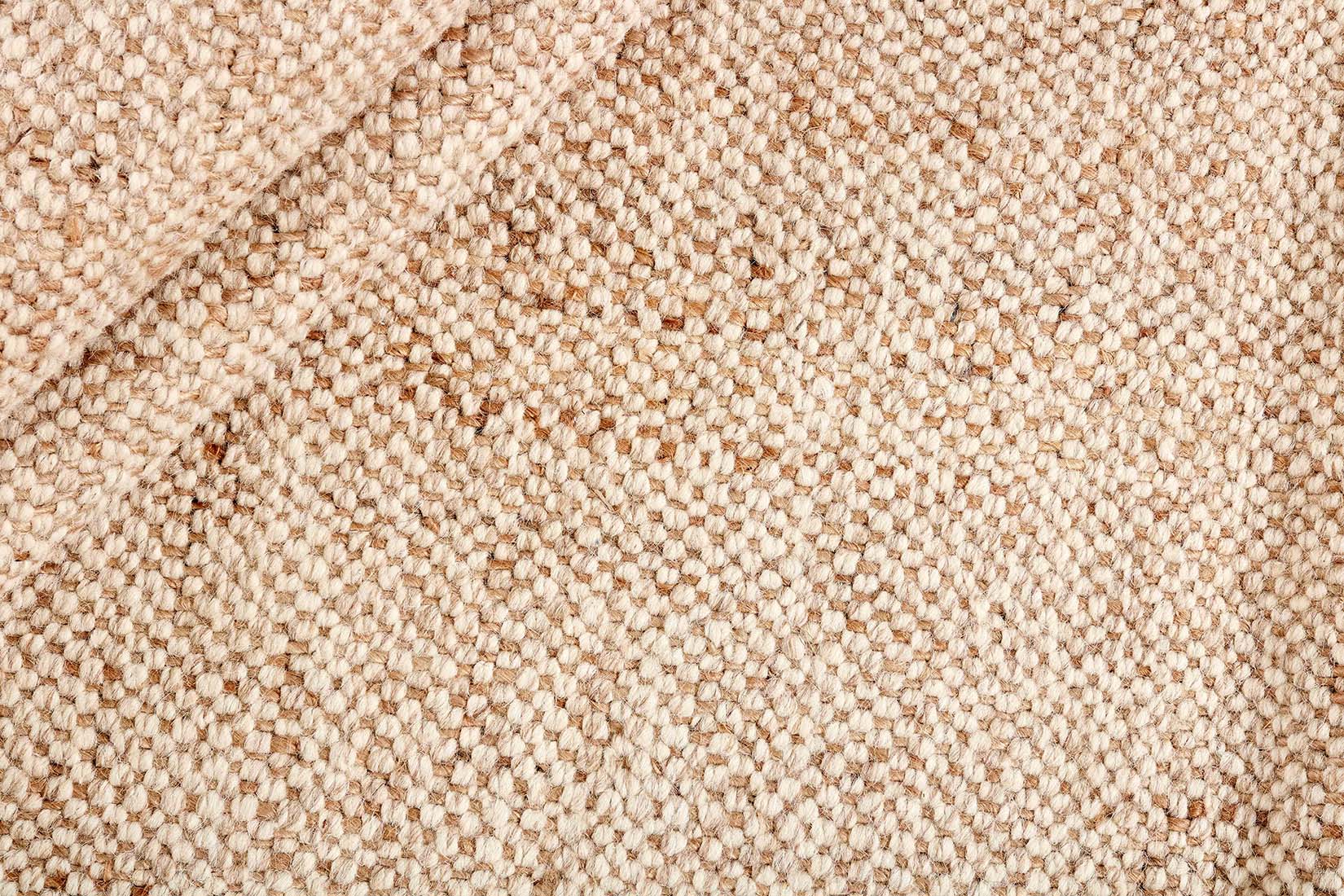 Beige textured flatweave rug
