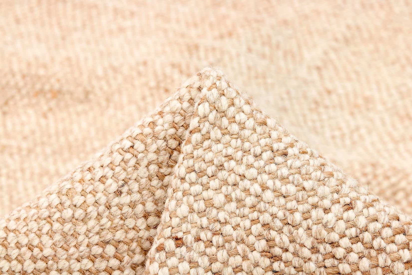 Beige textured flatweave rug