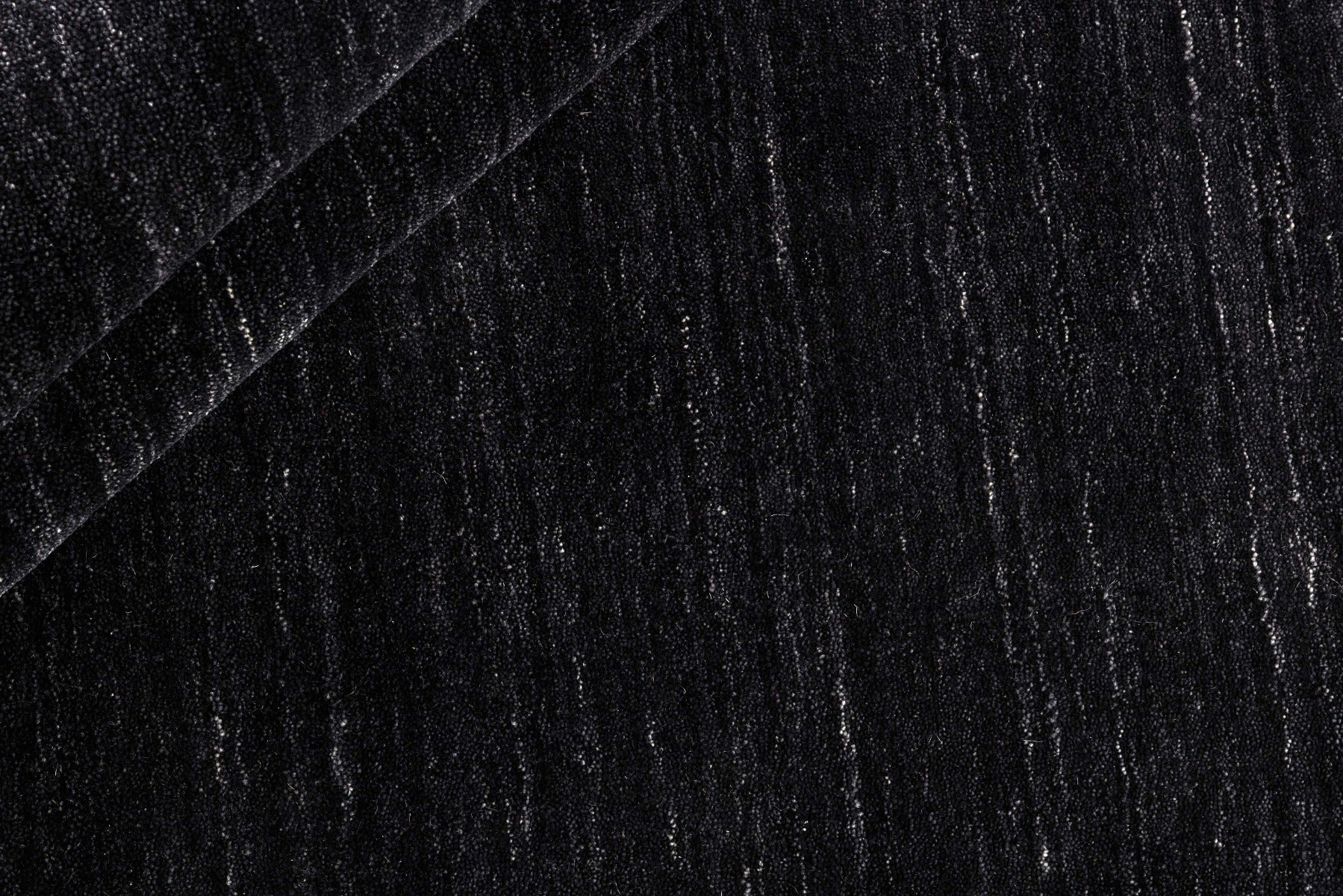 plain black wool circle rug