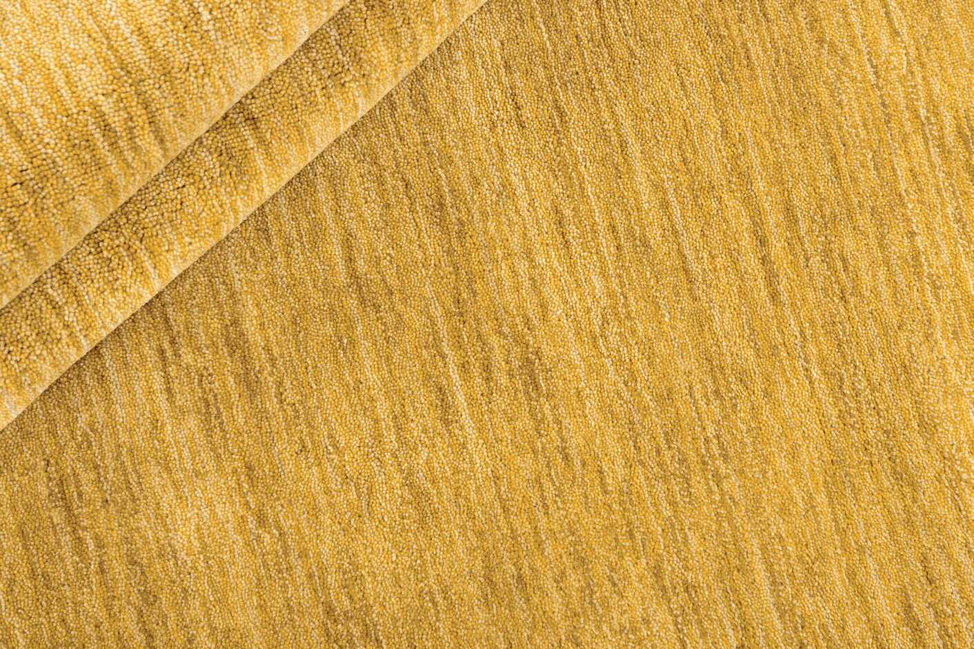 plain yellow wool circle rug