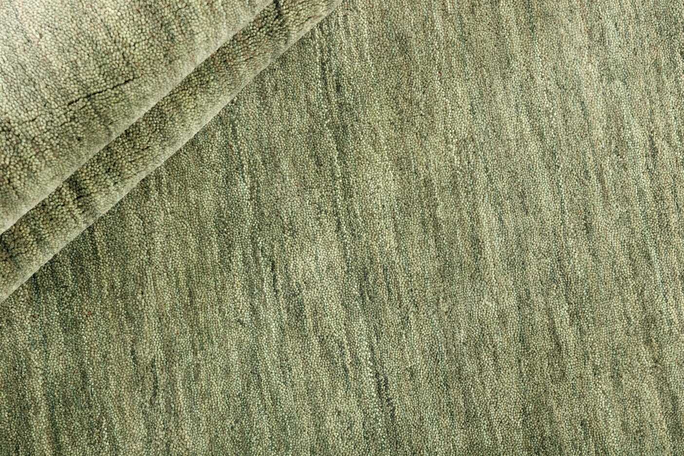 plain green wool circle rug