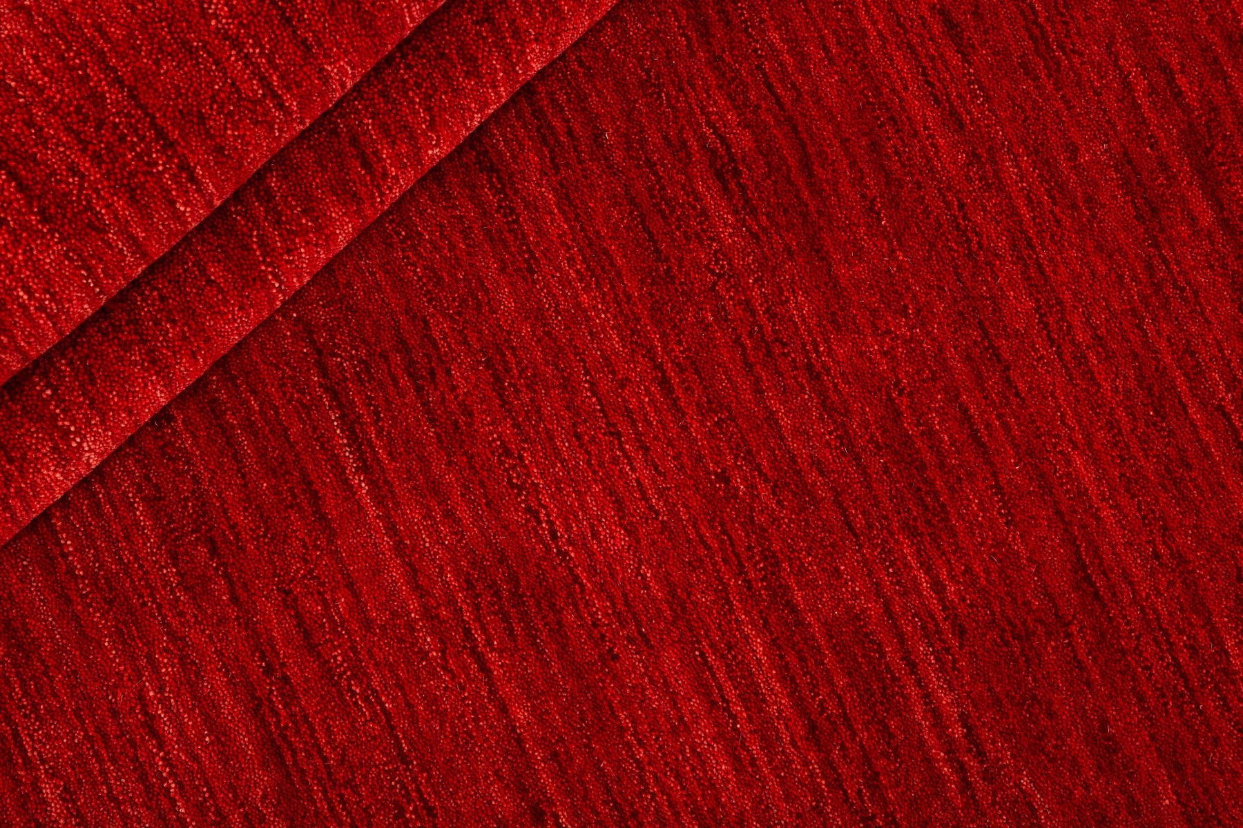 plain red wool circle rug