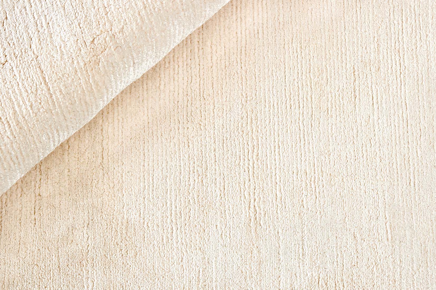 large plain beige viscose circle rug