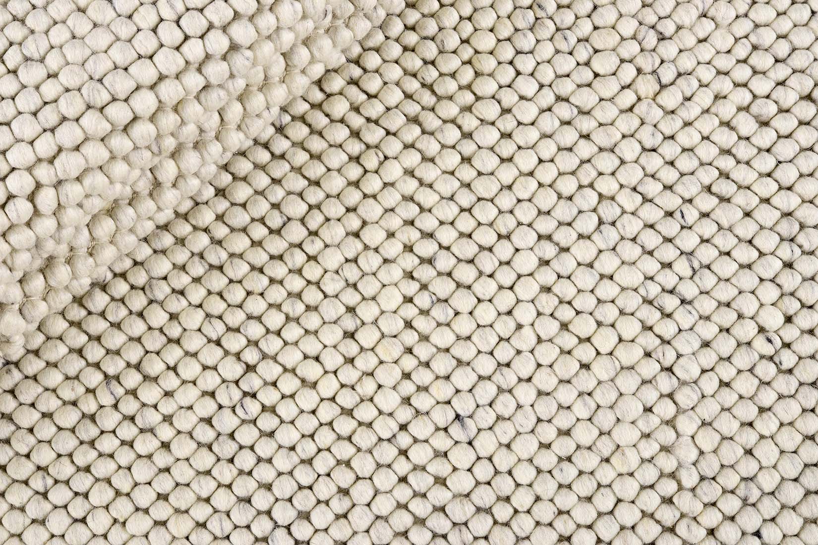 cream textured wool rug