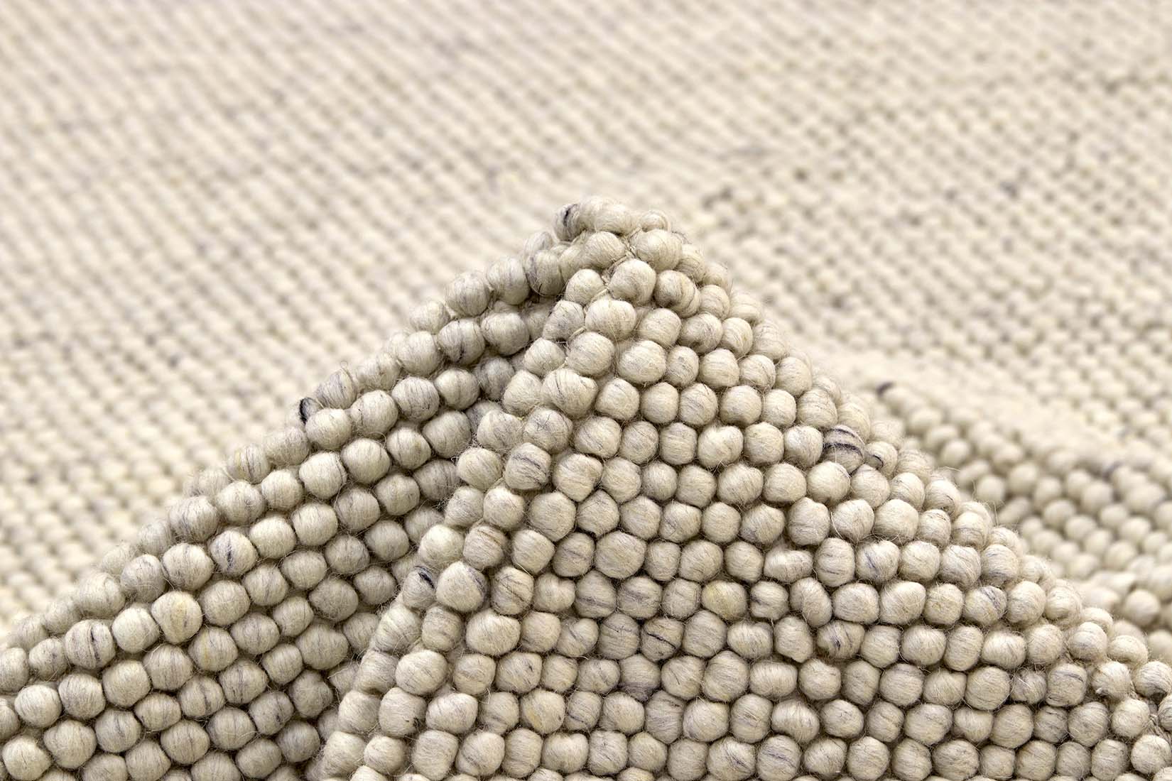 cream textured wool rug