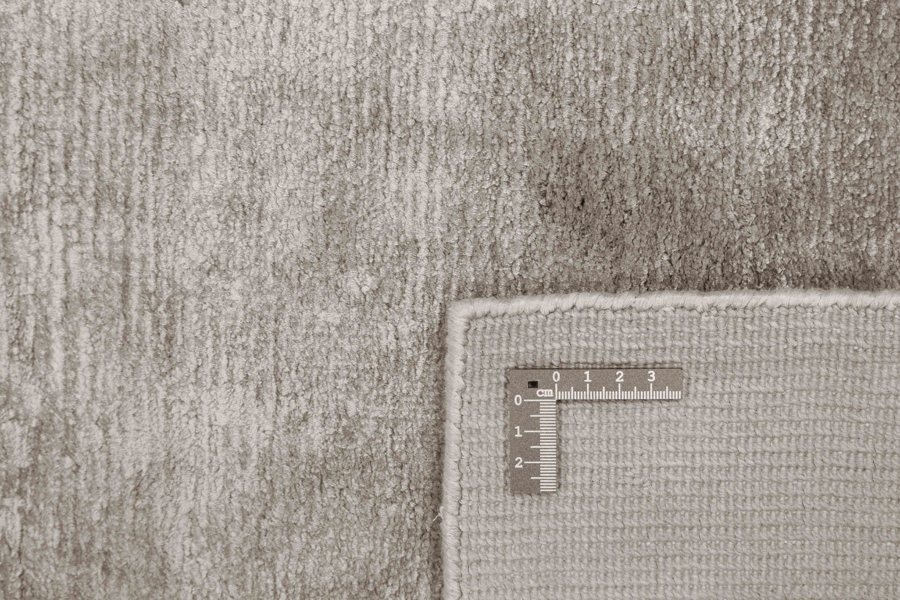 large plain light grey rug