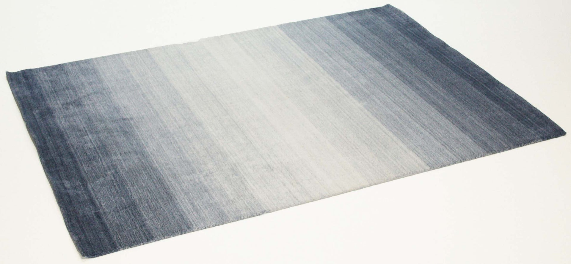 blue and white ombre rug