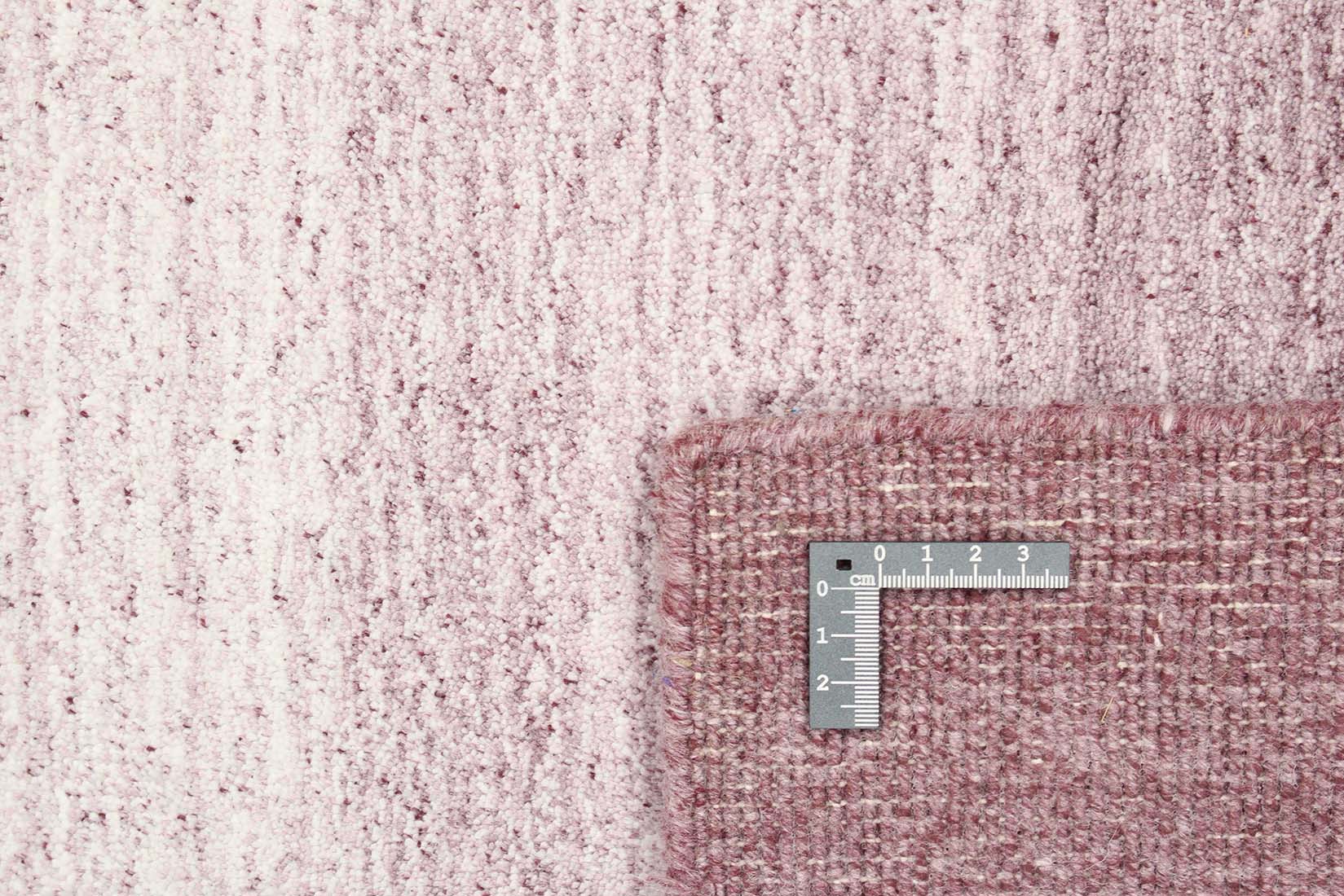 purple and pink ombre rug