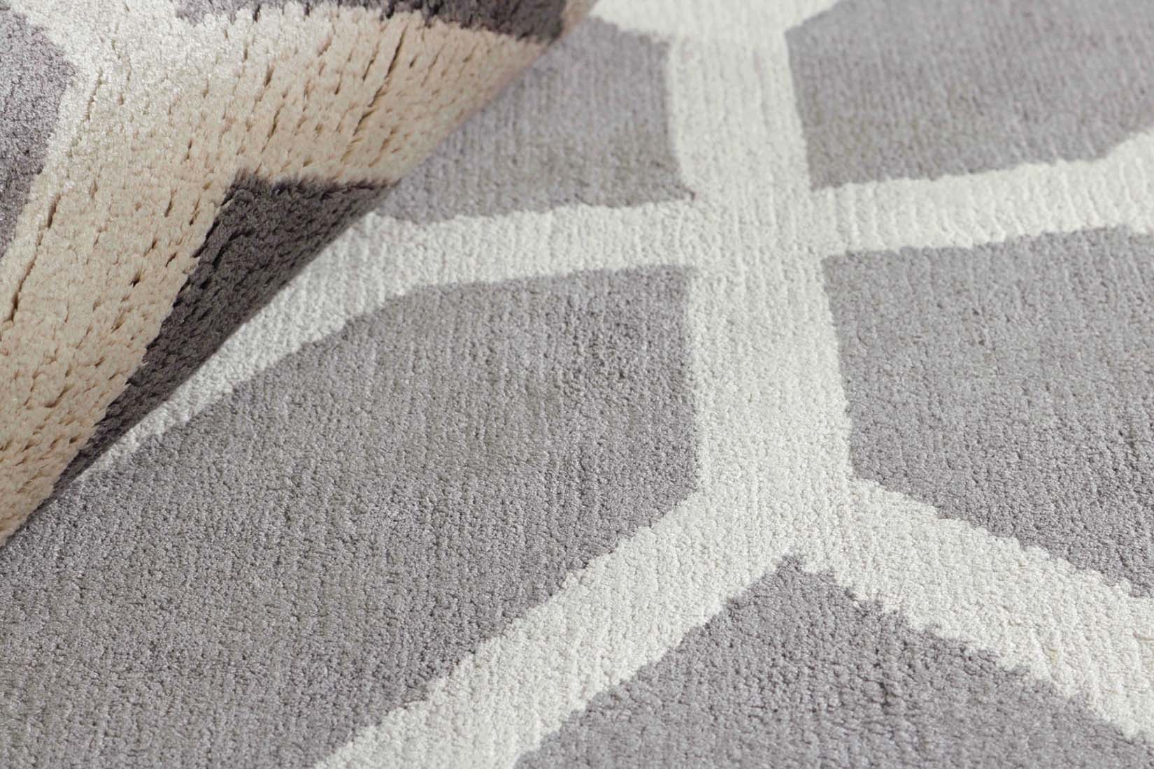 geometric area rug in grey and white