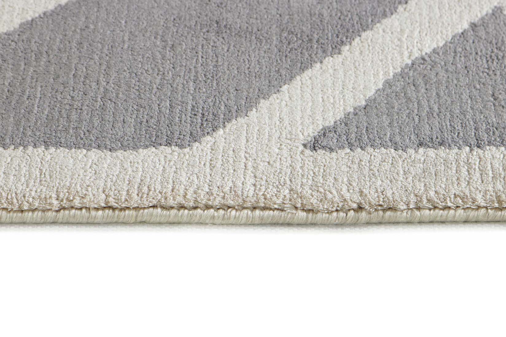 geometric area rug in grey and white