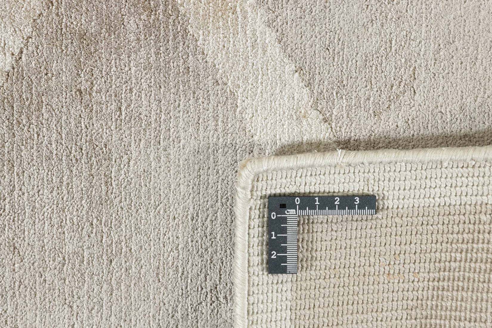 geometric area rug in grey and beige