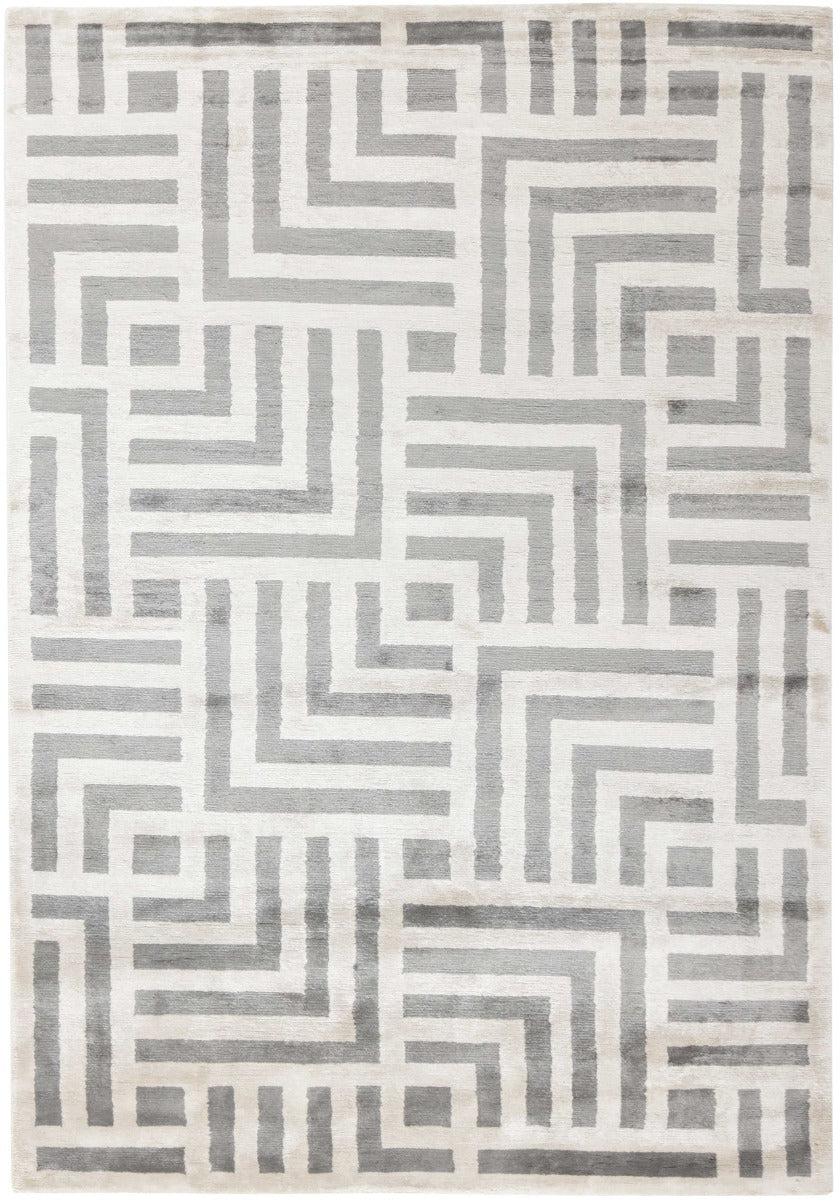 geometric area rug in grey and white