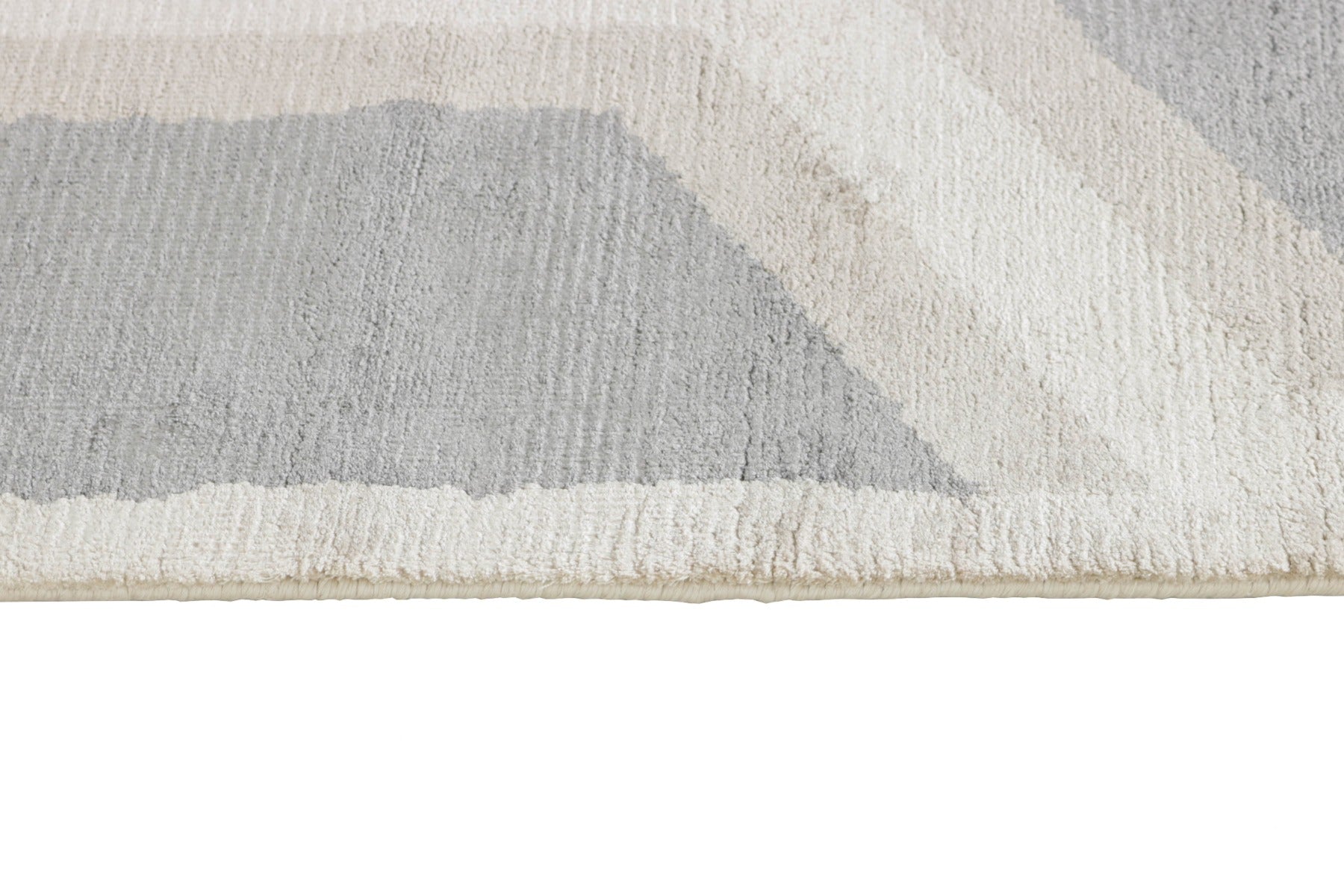 geometric area rug in grey and white