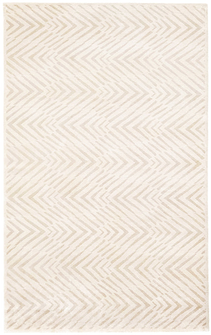 beige rug with a geometric pattern
