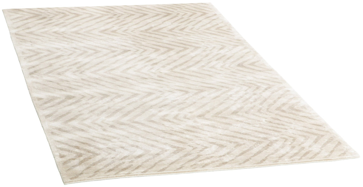 beige rug with a geometric pattern
