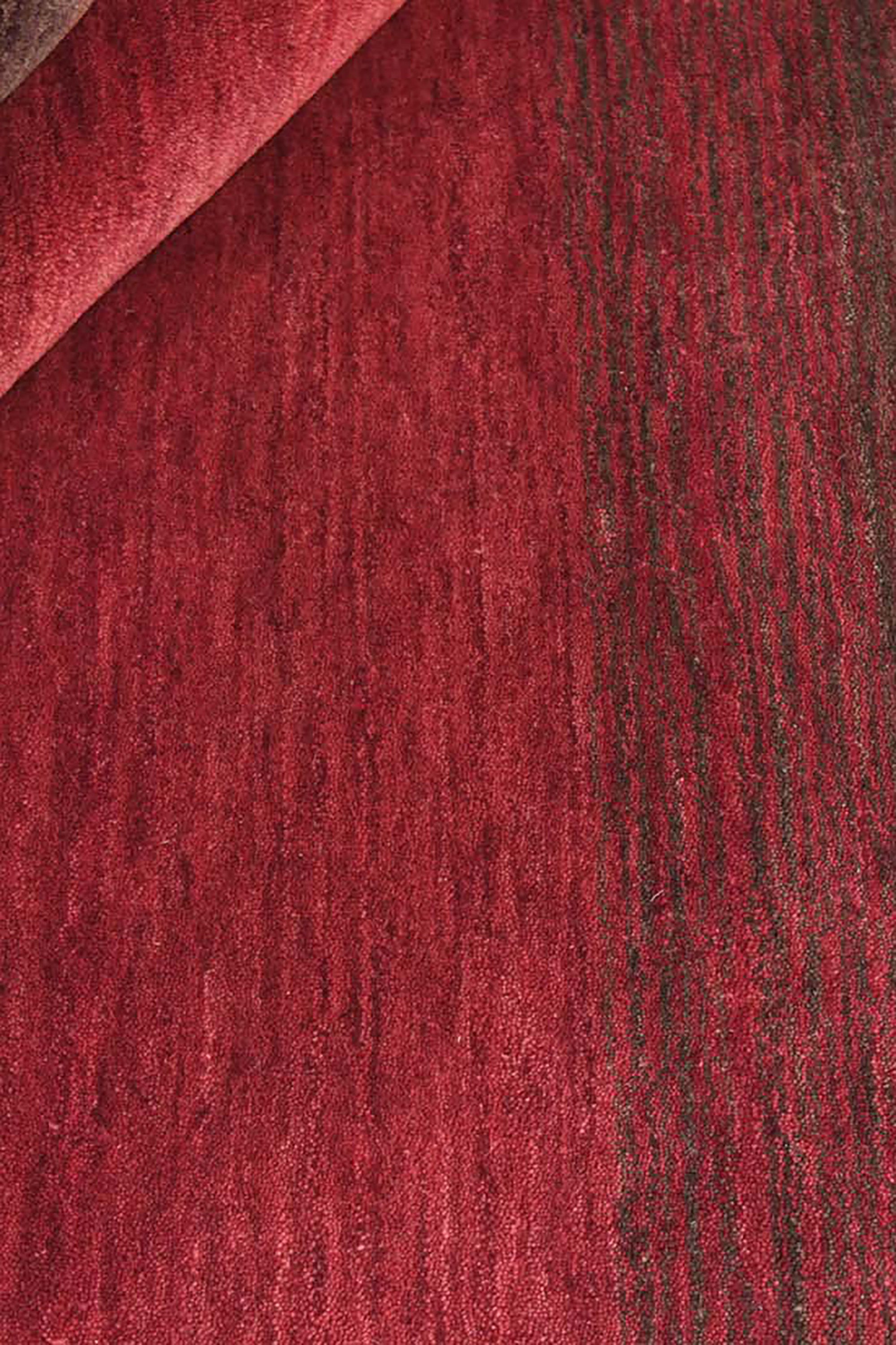 red and black ombre rug