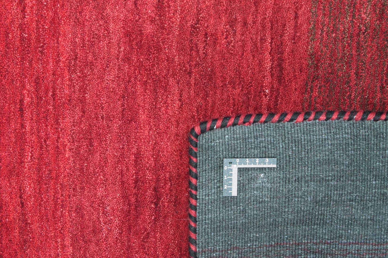 red and black ombre rug
