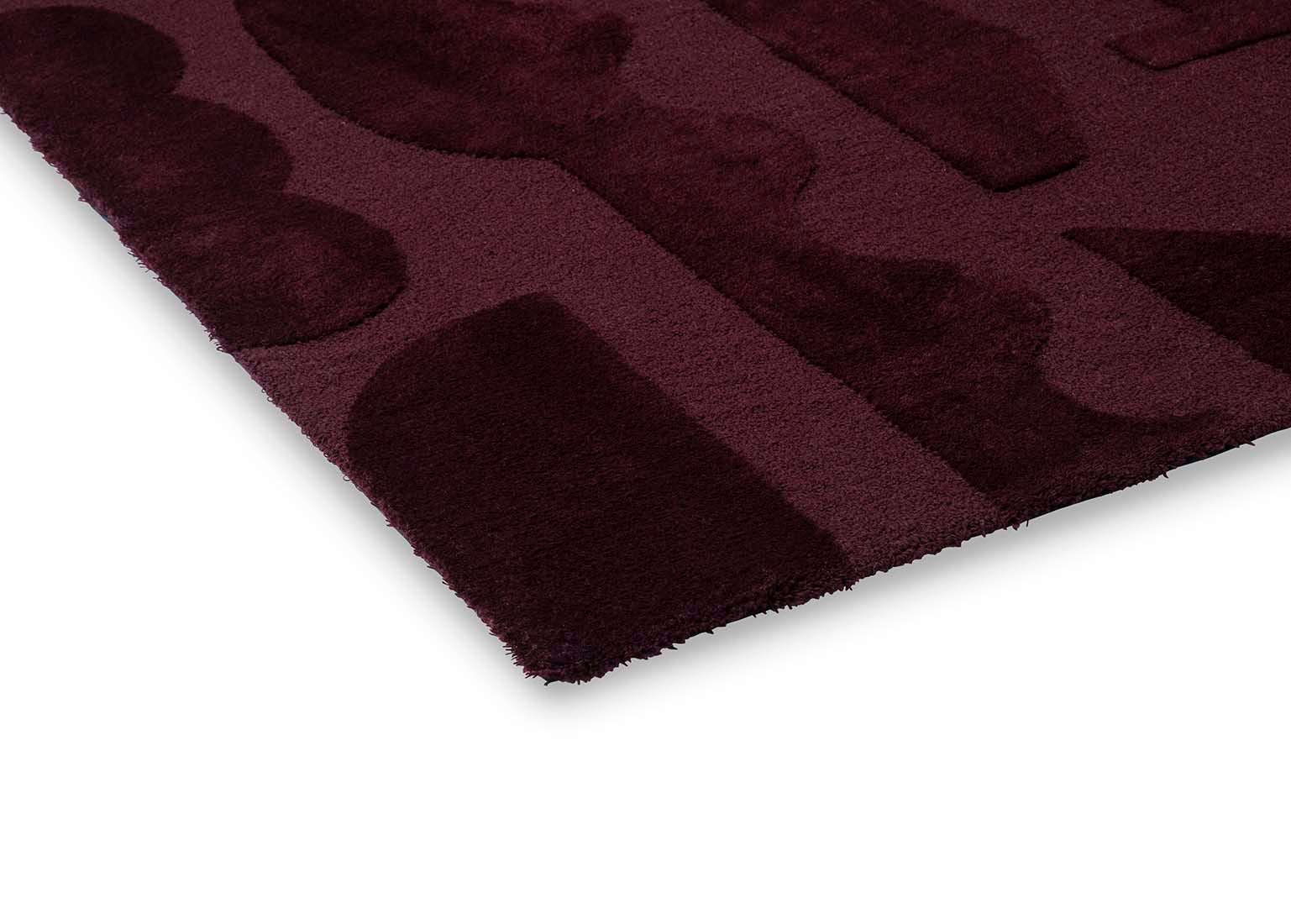 burgundy wool rug with geometric textured design
