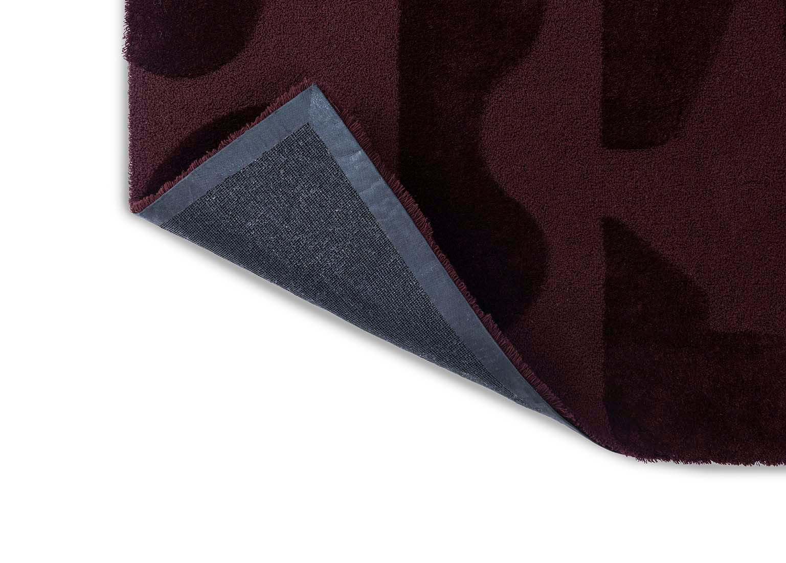 burgundy wool rug with geometric textured design