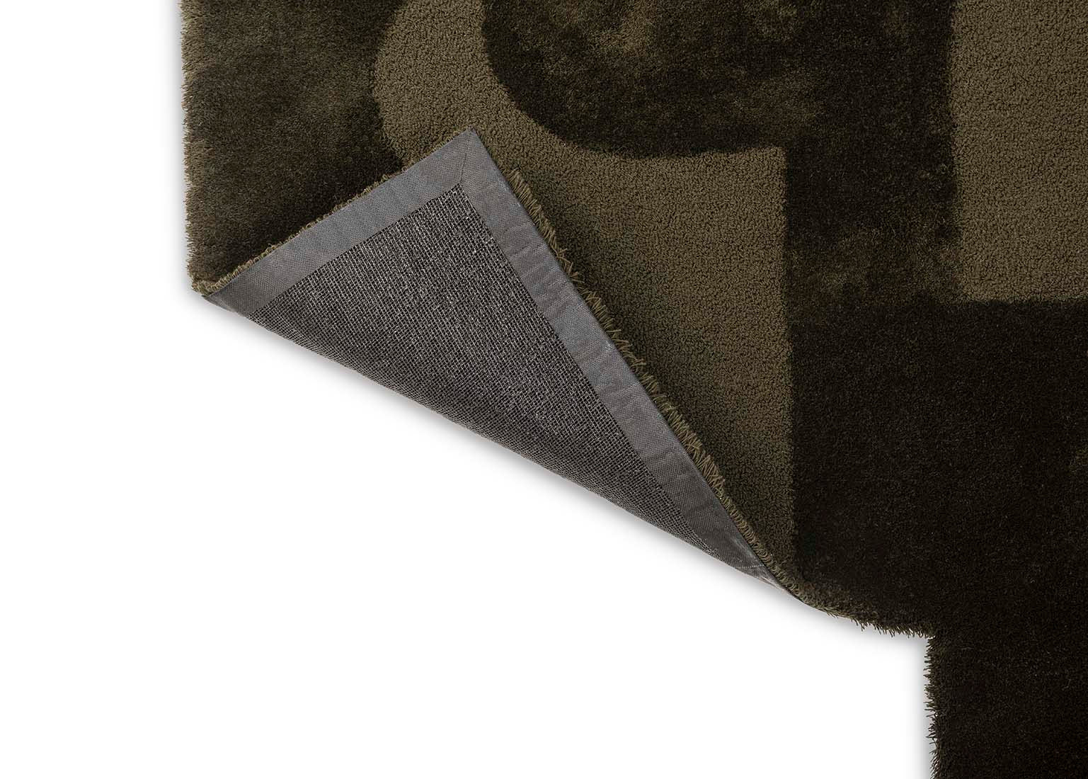 forest green wool rug with geometric textured design