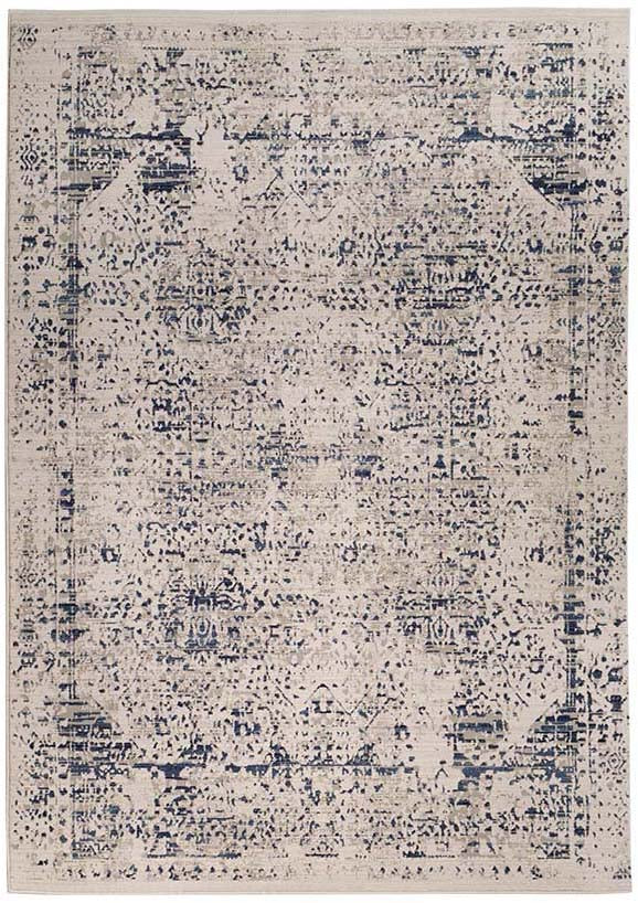grey Persian style area rug with navy detail