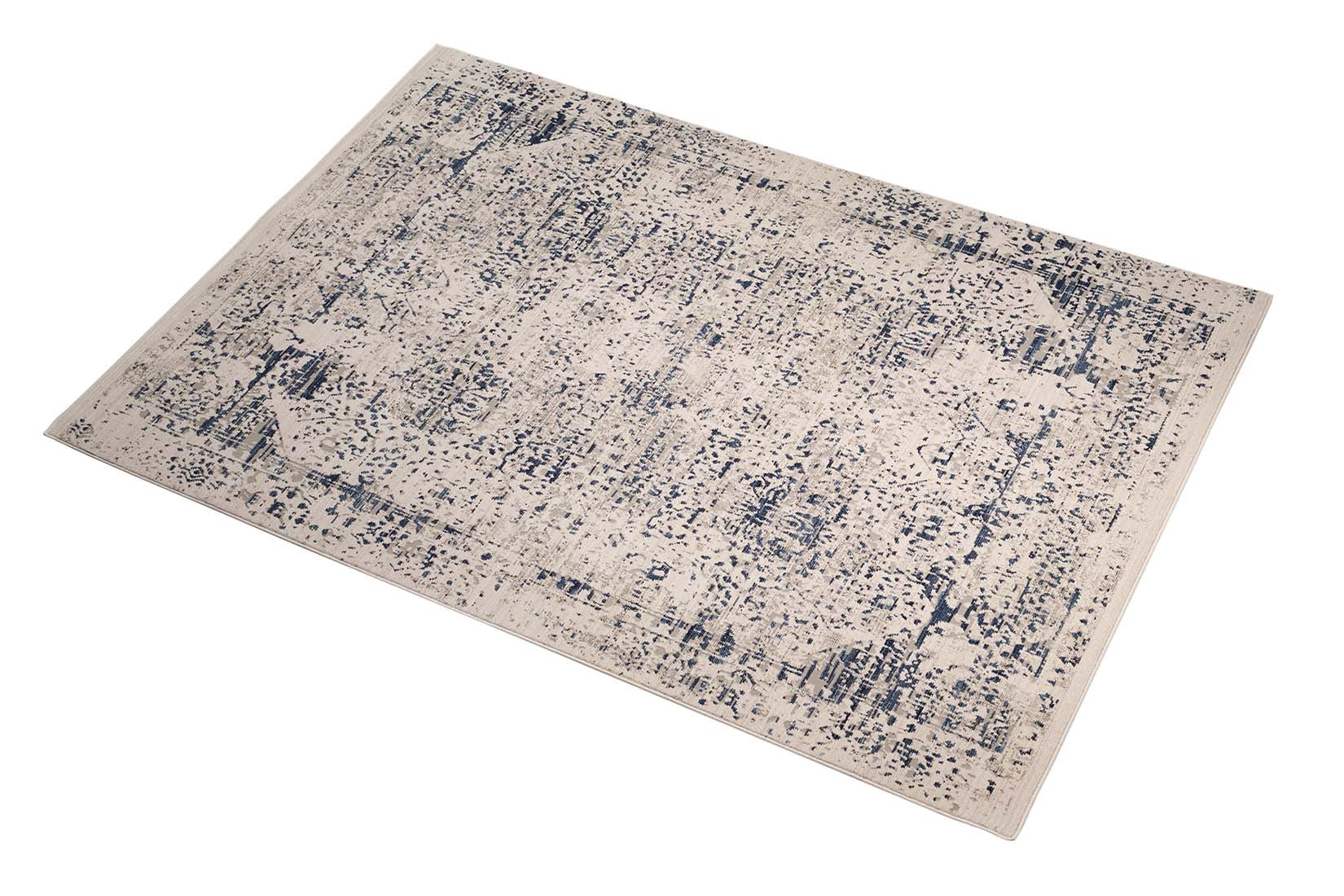 grey Persian style area rug with navy detail