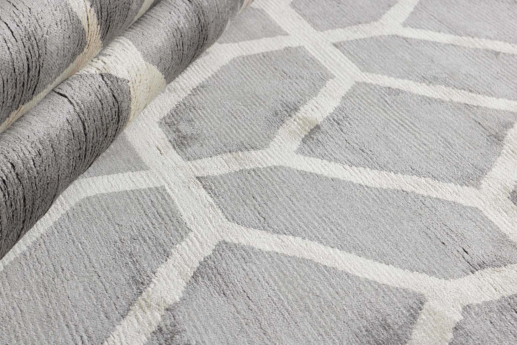 geometric area rug in grey and white