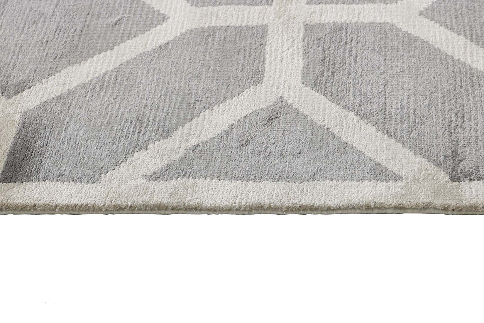 geometric area rug in grey and white