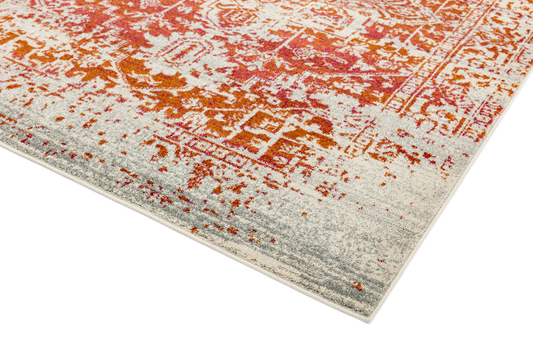 orange rug with an oriental design