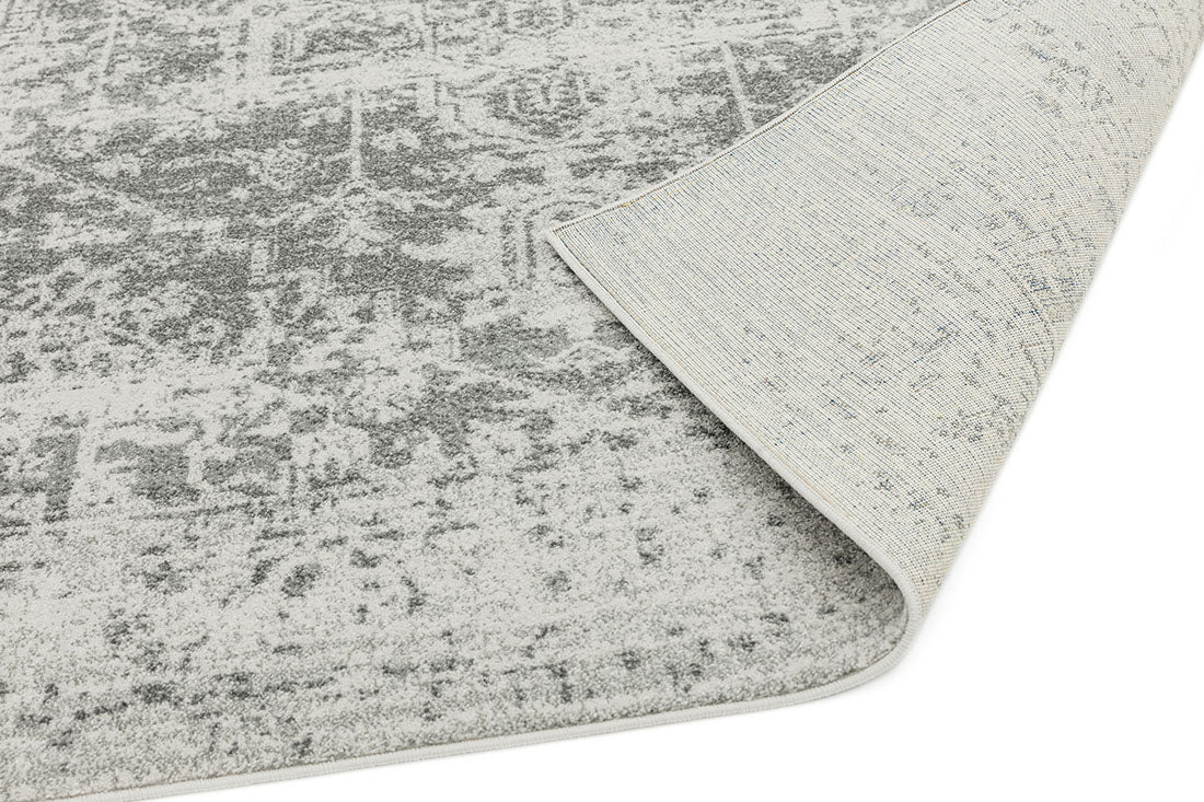 grey rug with an oriental design