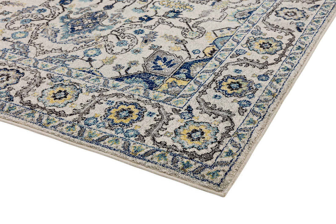 blue and white rug with an oriental design