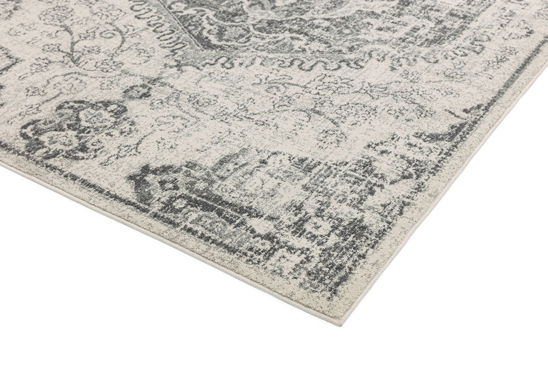 grey rug with an oriental pattern