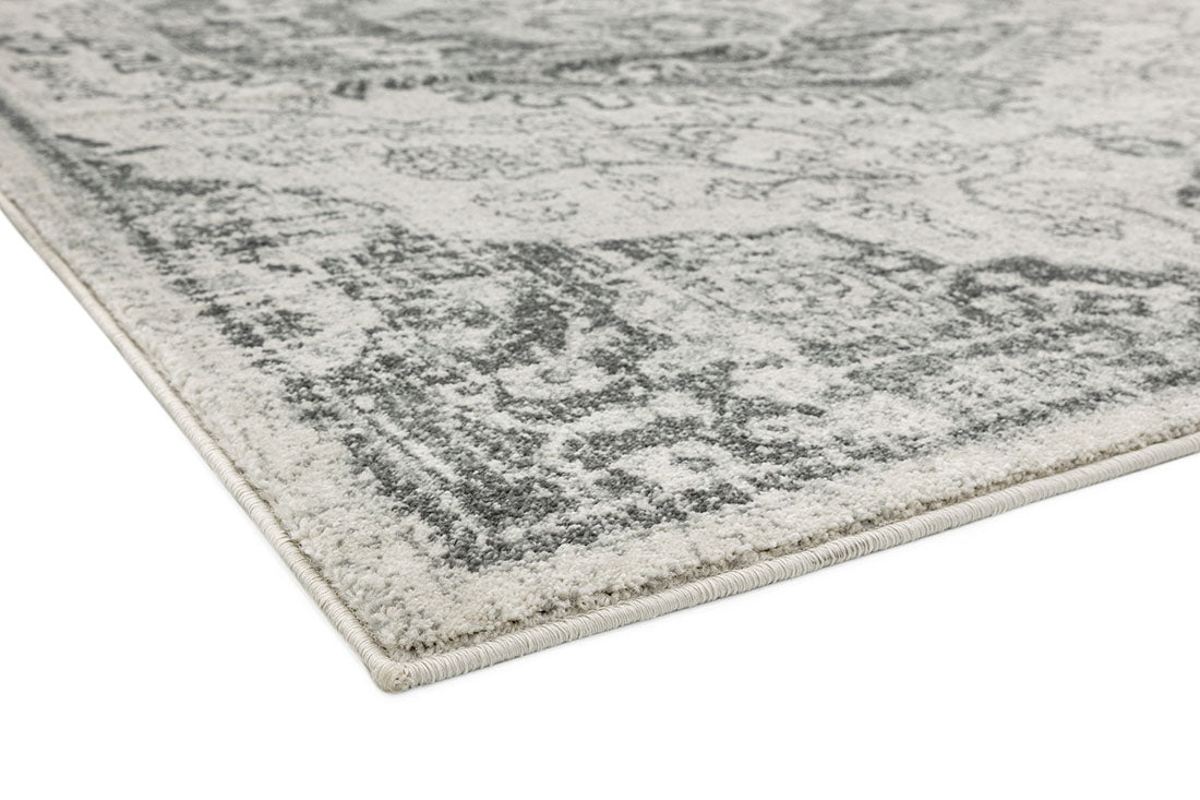grey rug with an oriental pattern