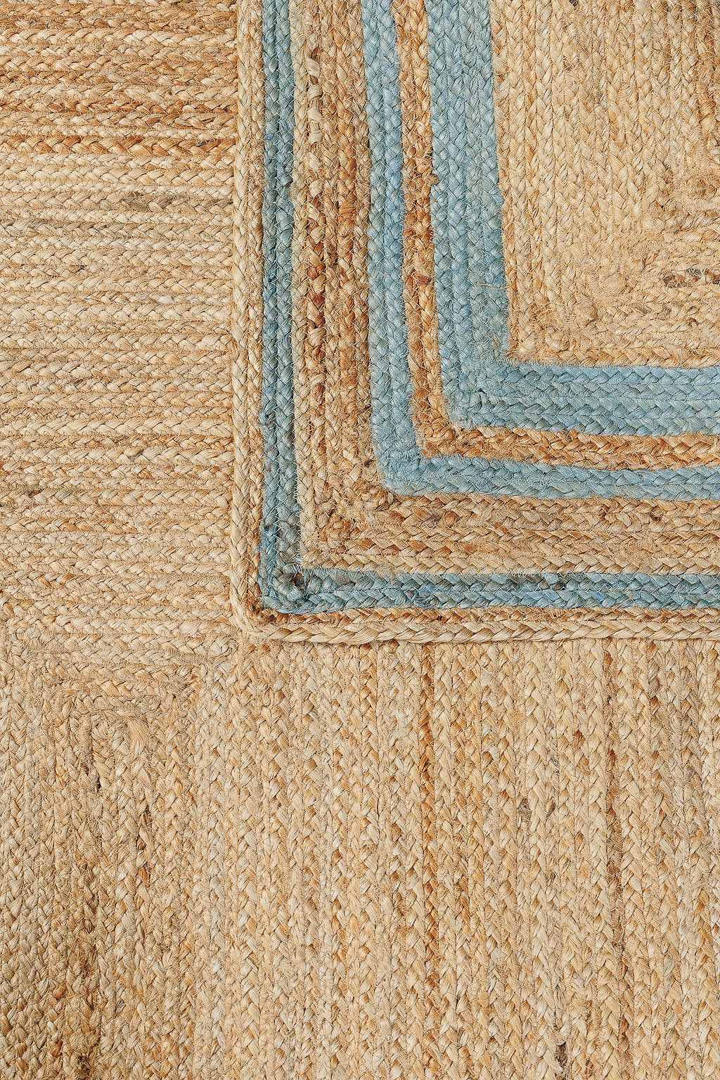 jute rug with light blue border