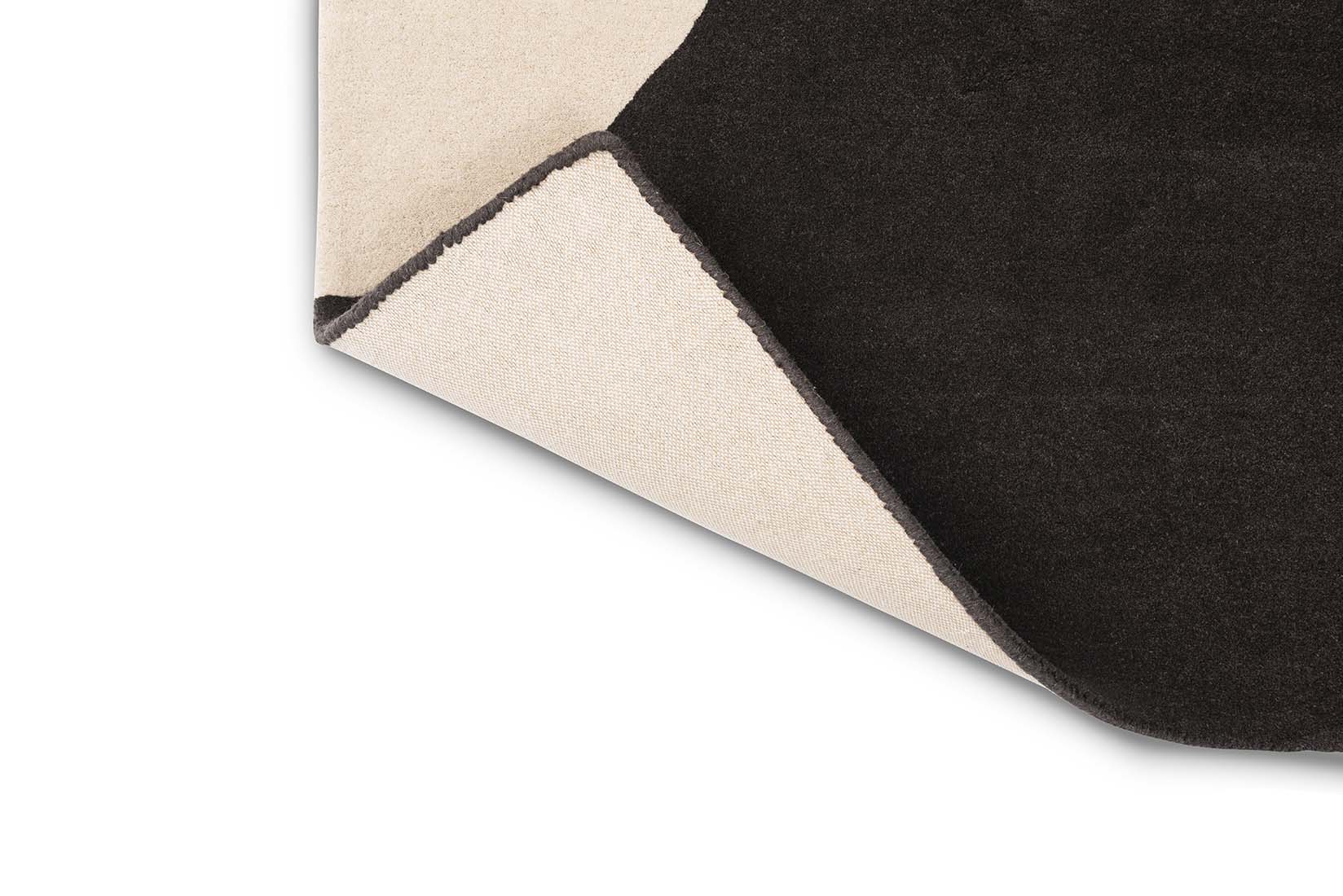 grey and black wool rug with retro floral design