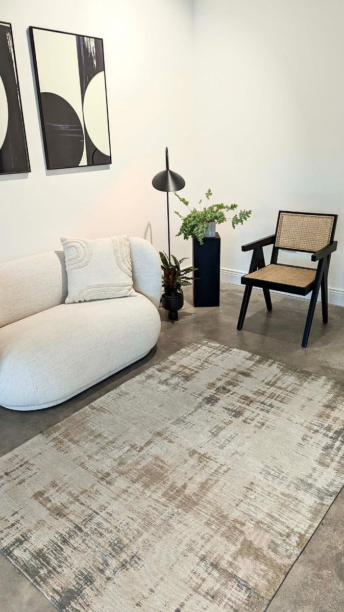 beige flatweave rug with modern abstract design