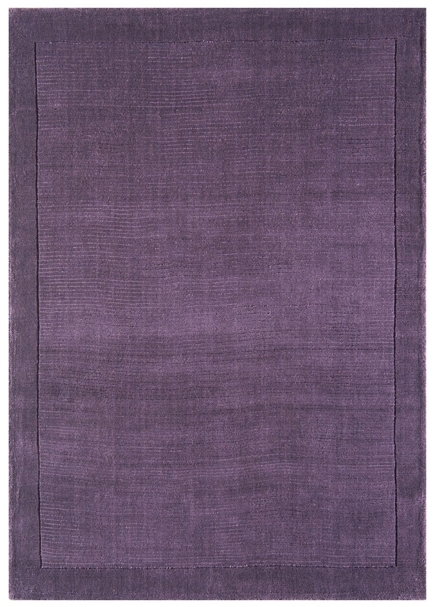 A plain purple rectangle-shaped wool rug with thin border.