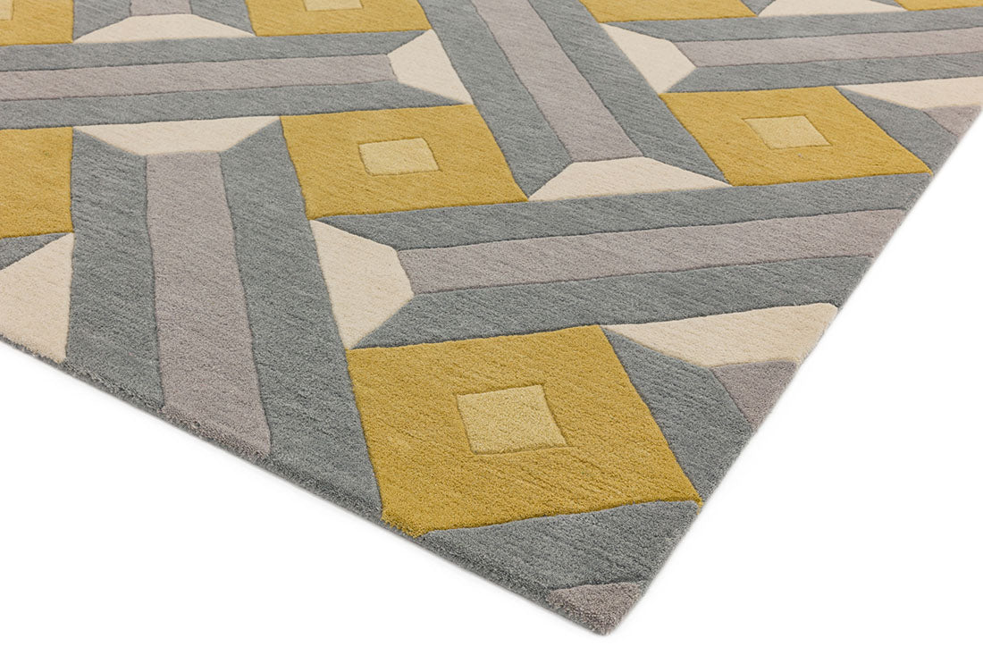 multicolour geometric rug in mustard yellow and grey