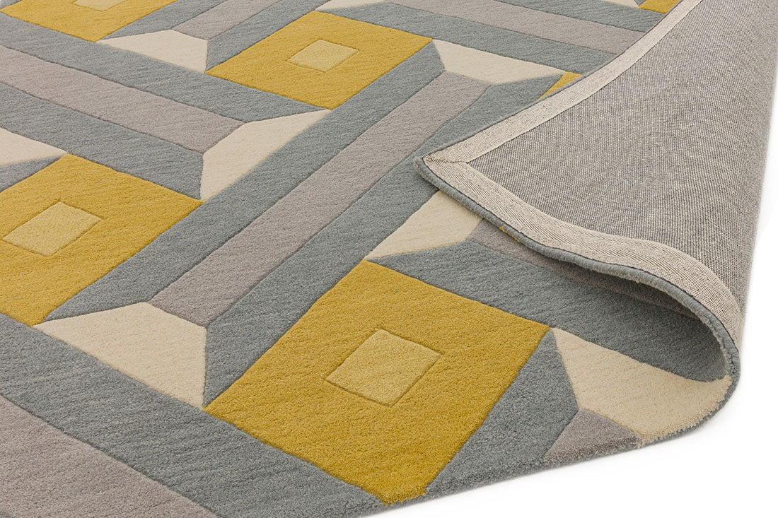 multicolour geometric rug in mustard yellow and grey