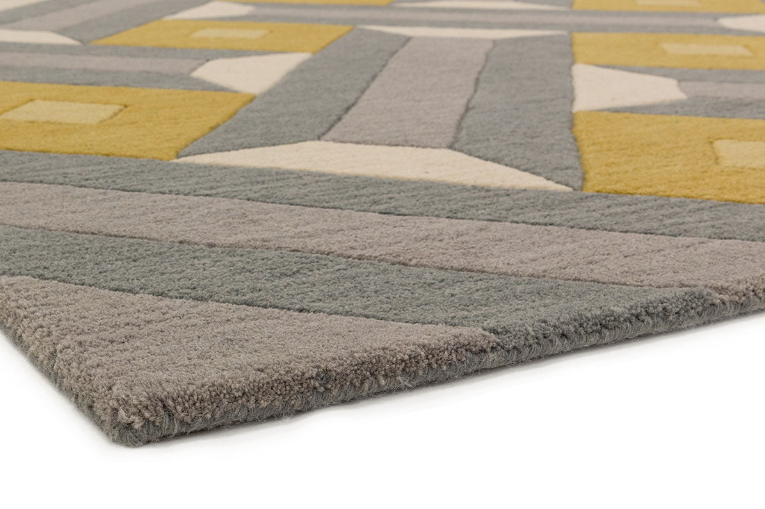 multicolour geometric rug in mustard yellow and grey