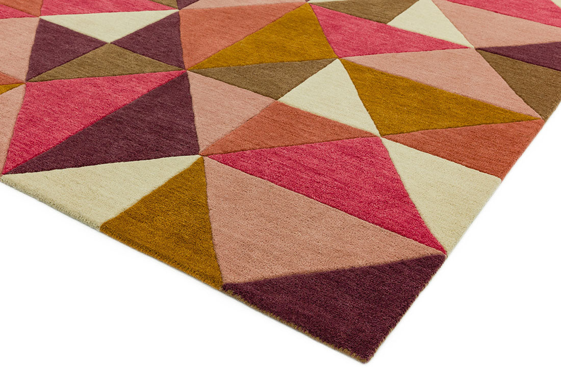 multicolour geometric rug in pink purple and brown
