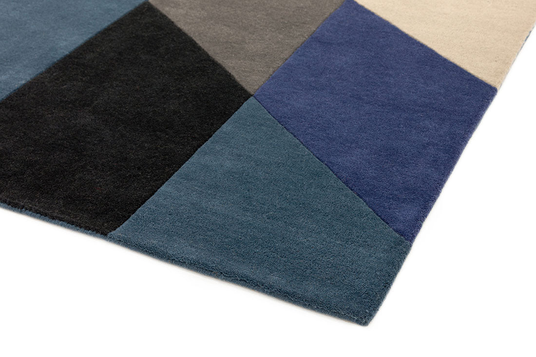 multicolour geometric rug in blue and black