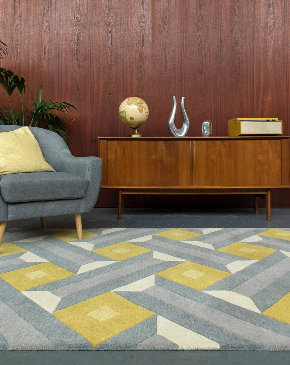 multicolour geometric rug in mustard yellow and grey