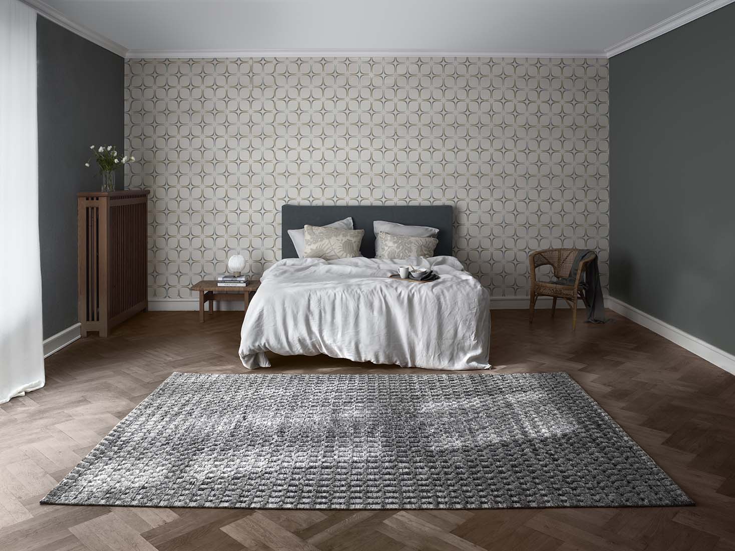 grey area rug with geometric pattern
