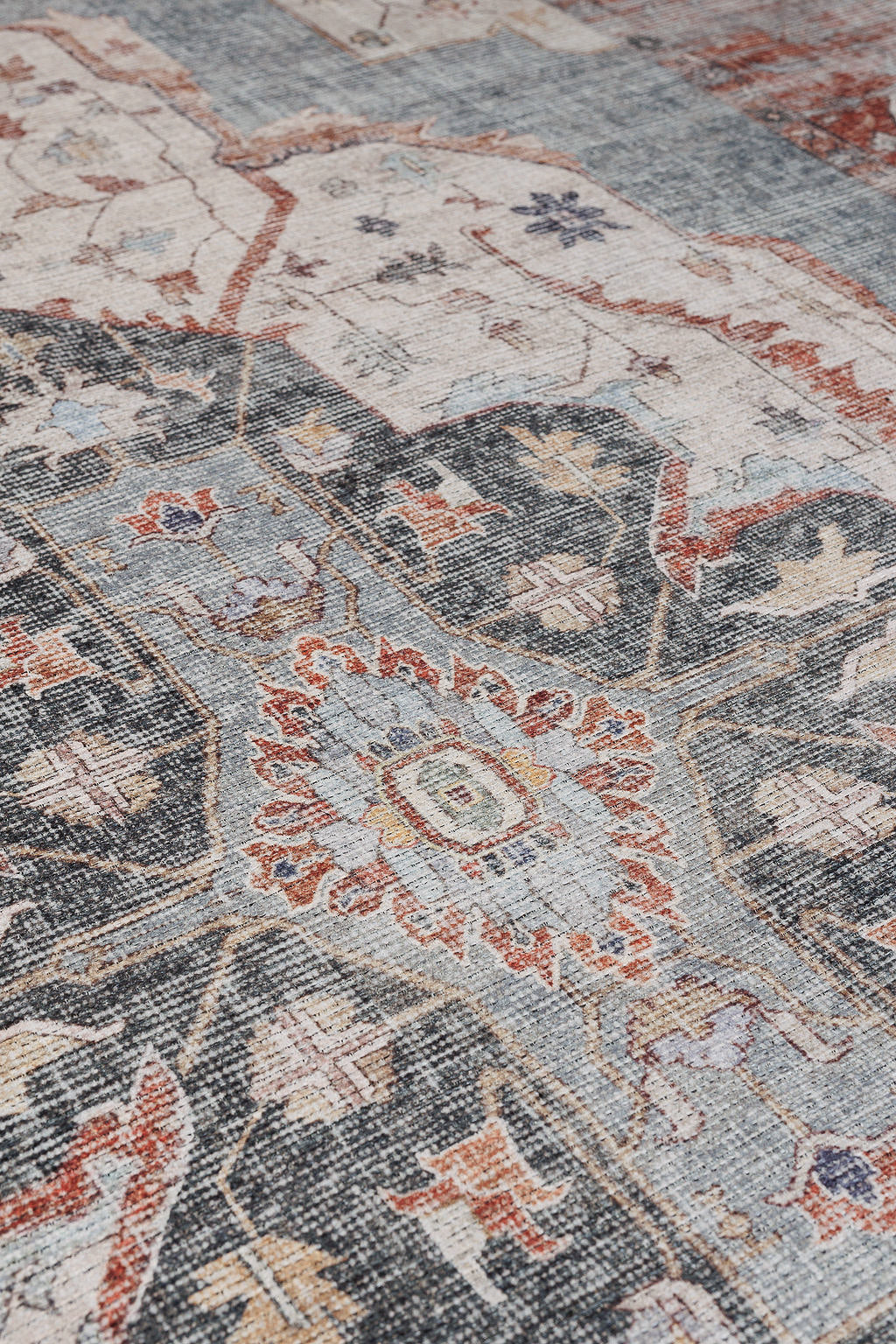 Bordered red and blue vintage style rug