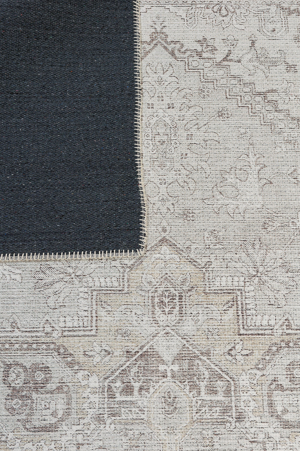 Brown bordered vintage style rug