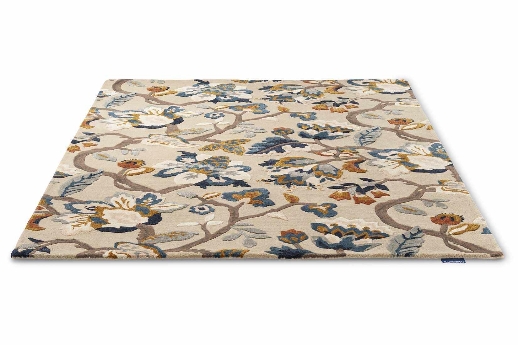 stone coloured wool and viscose rug with multicolour floral design